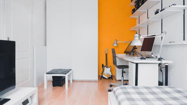 Orange Highlight Bedroom for a Music Lover