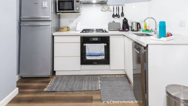 Use Two Matching Rugs to Get the Most of Your Kitchen Space